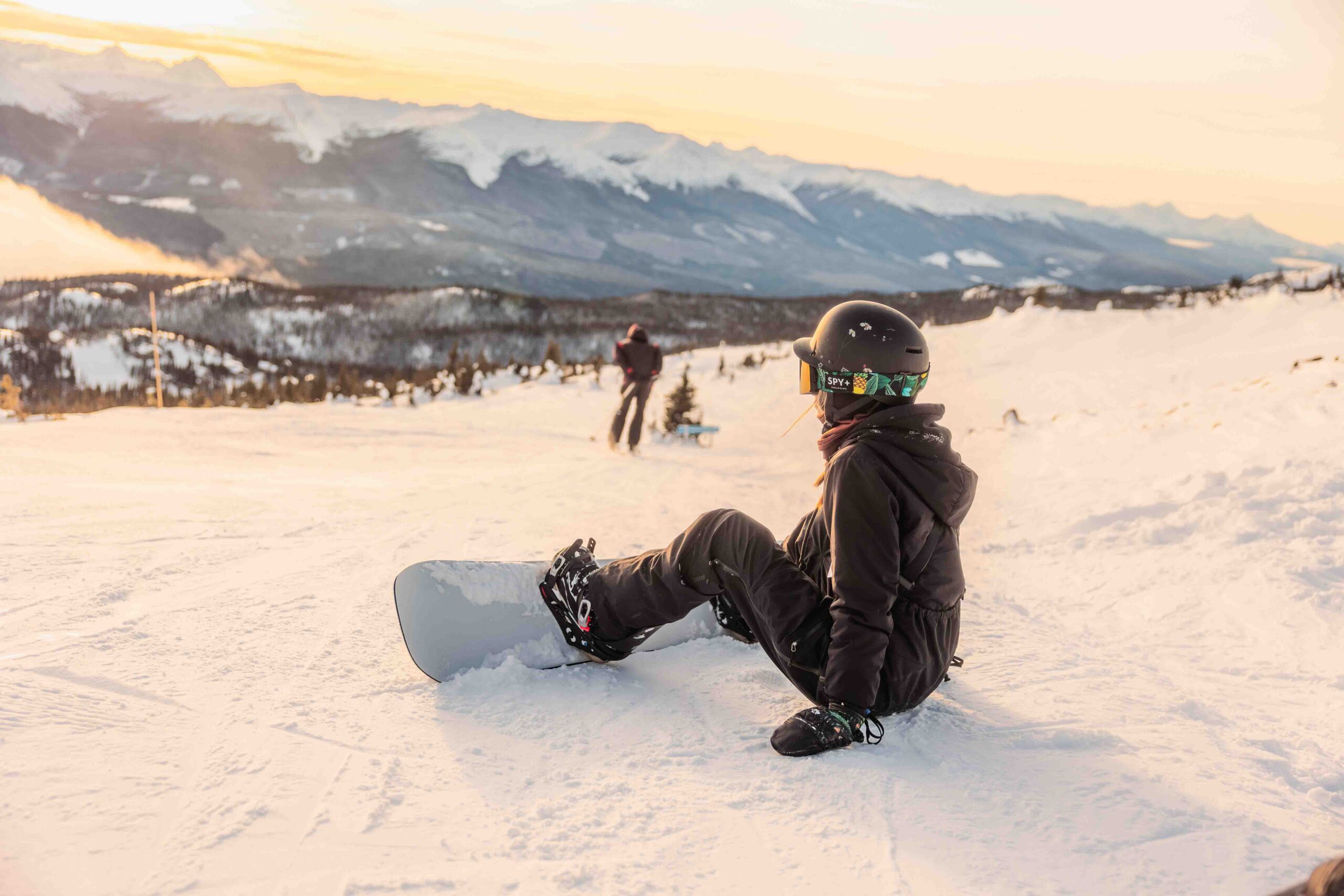 women sitting in snow 3